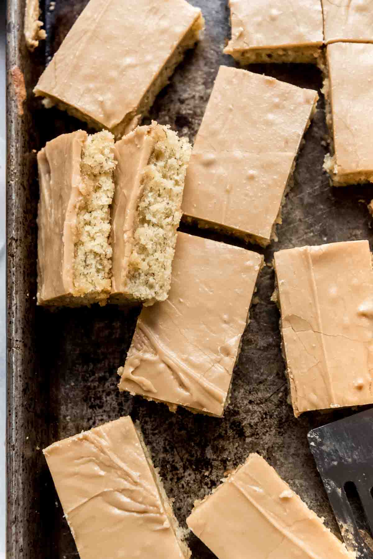 Sliced banana bars on a baking sheet.