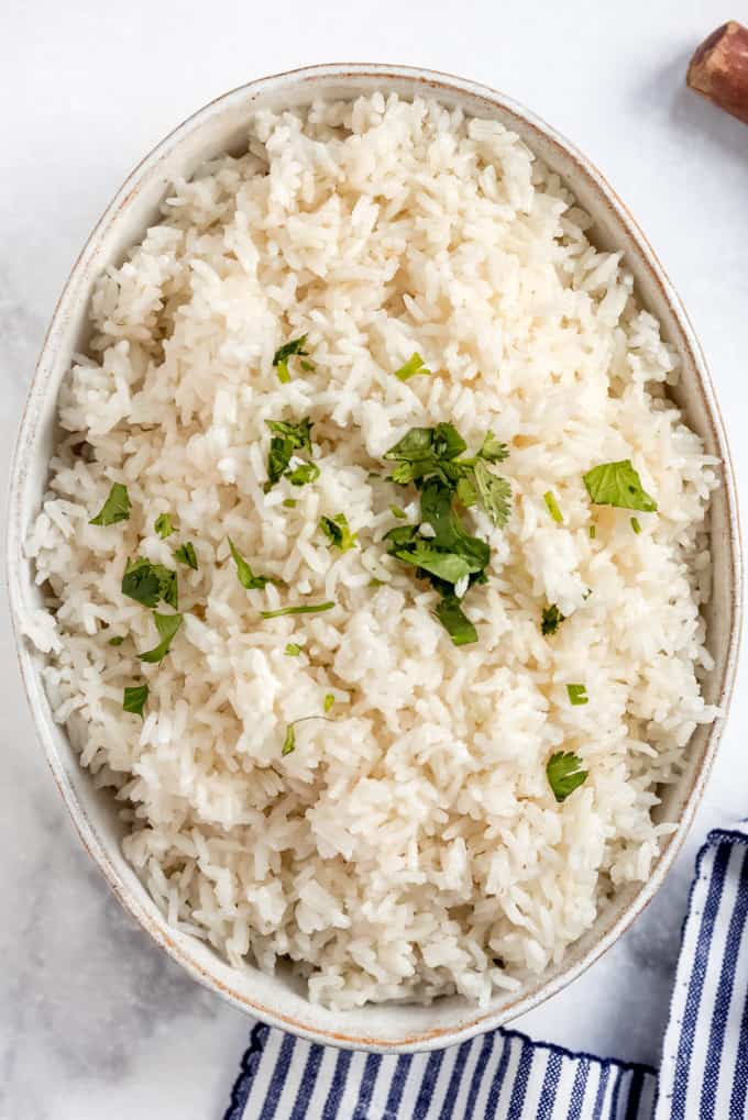 a serving bowl filled with coconut jasmine rice