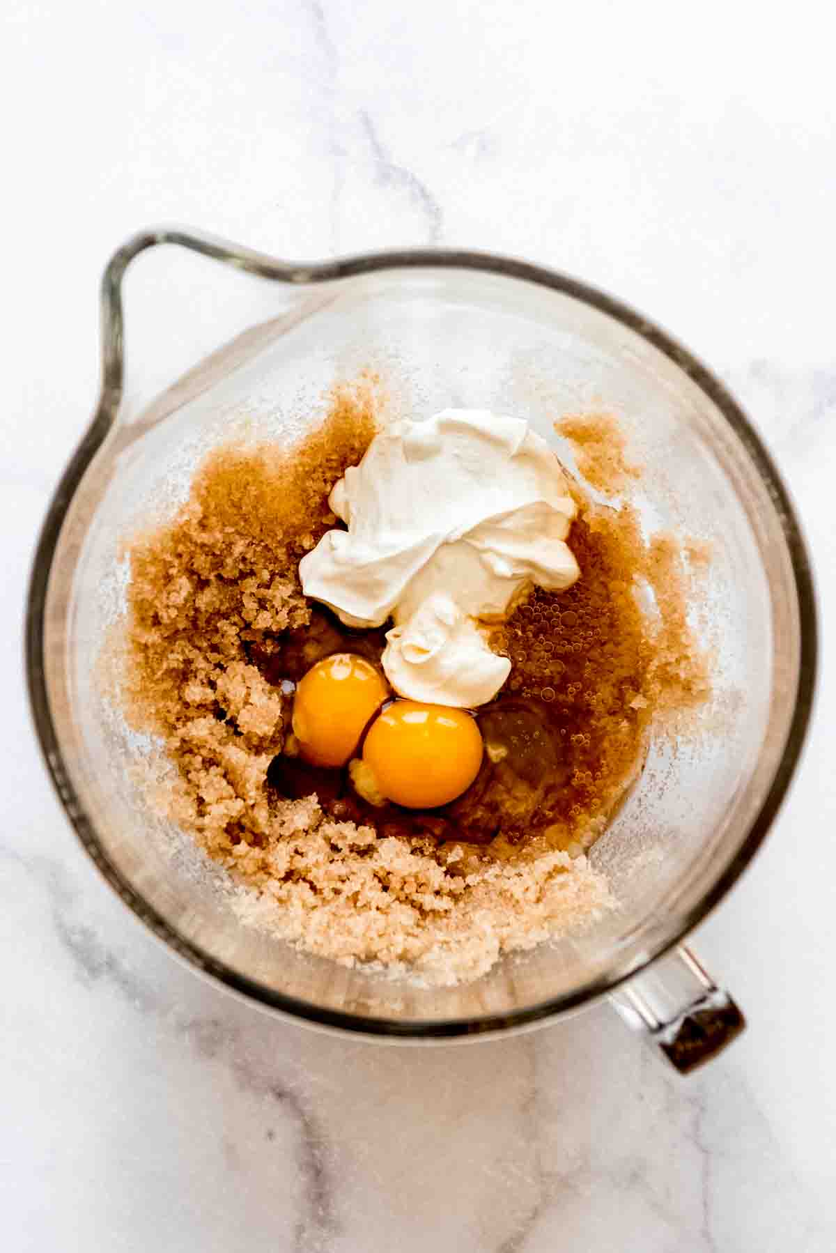 Ingredients in a large glass mixing bowl.