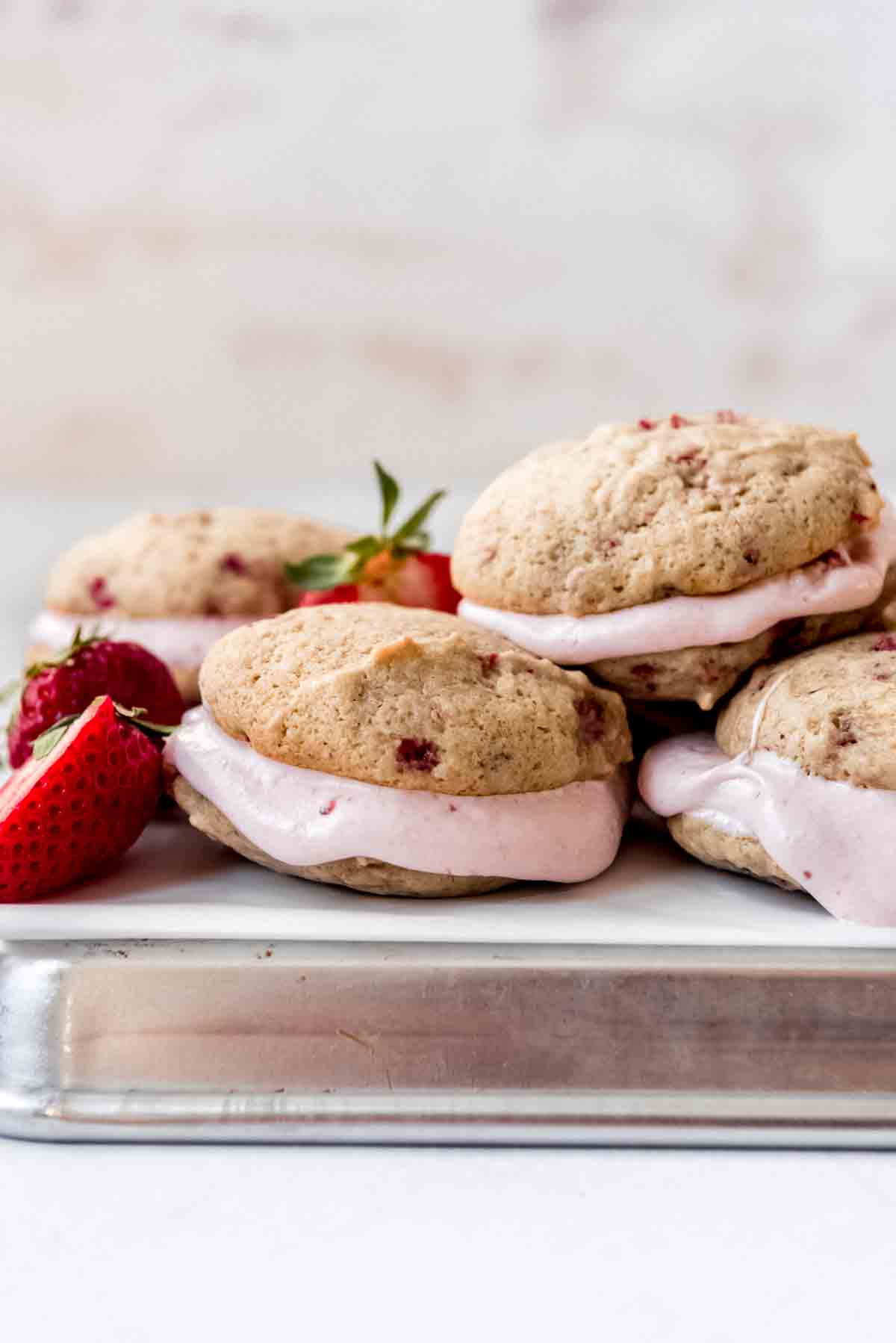 Strawberry whoopie pies with soft strawberry marshmallow filling.