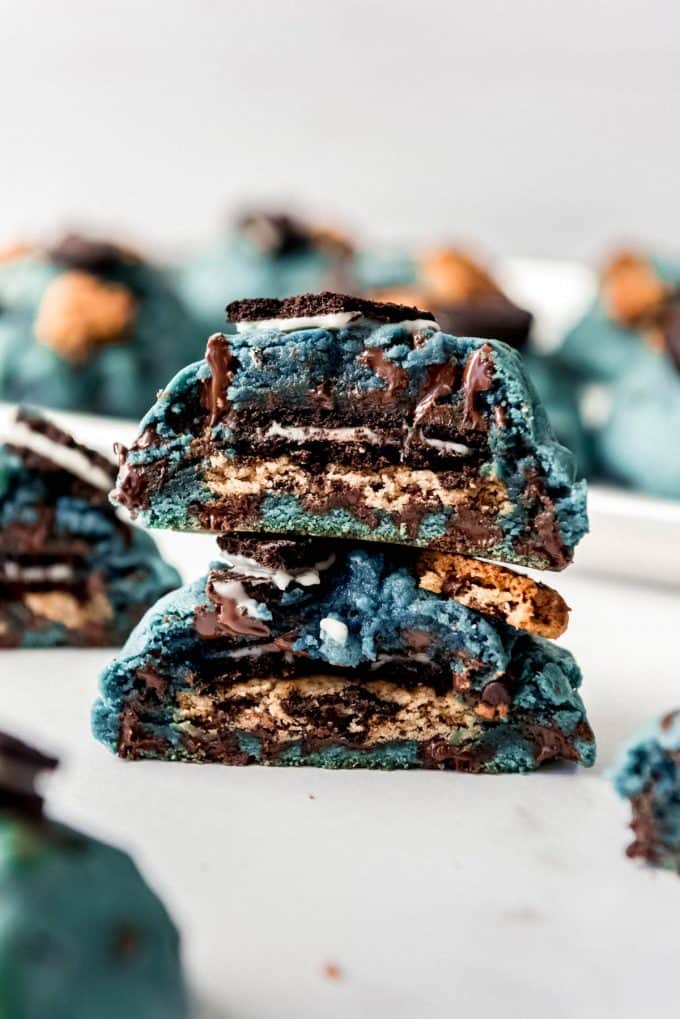stacked halves of chocolate chip cookies stuffed with Oreos and Chips Ahoy