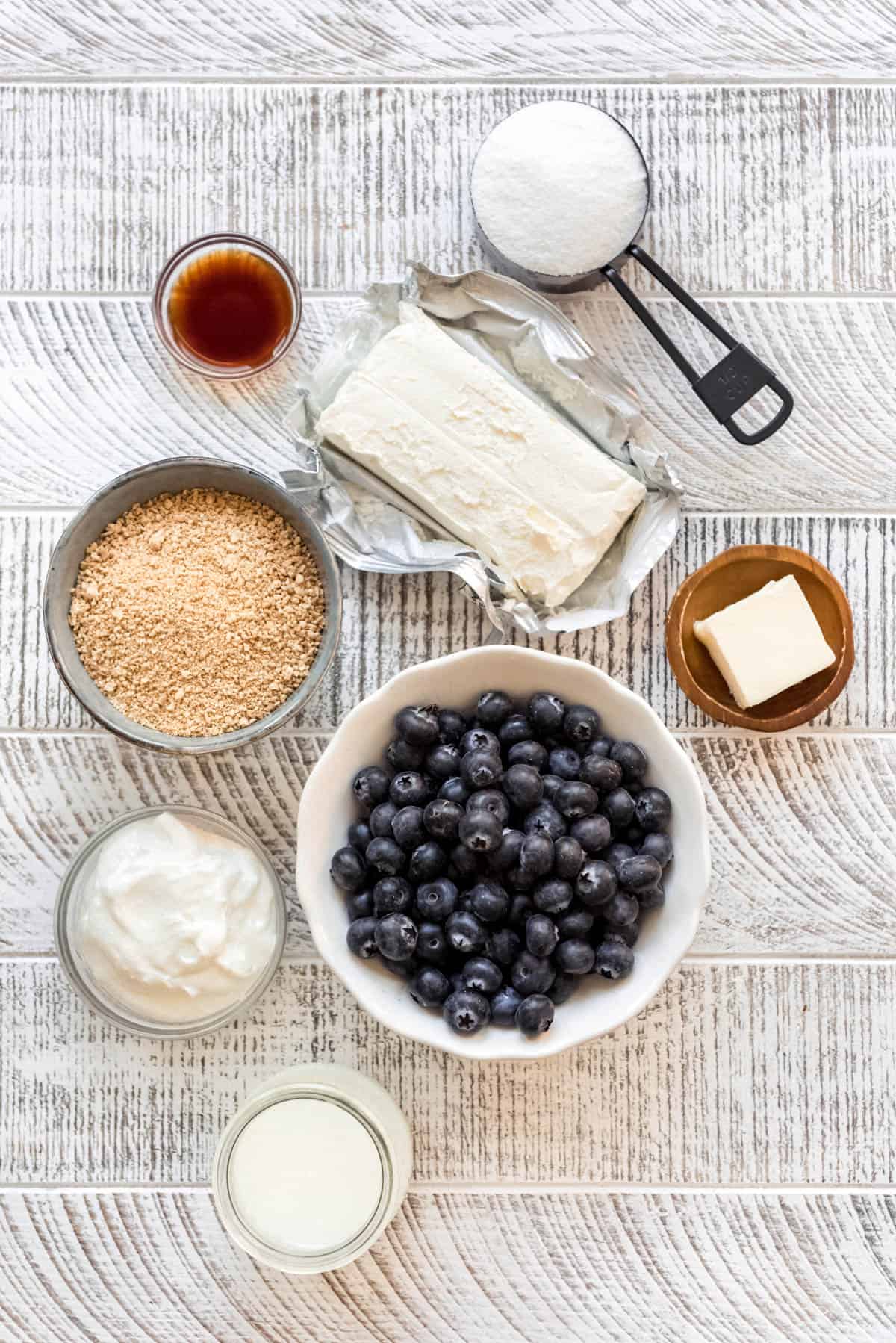 blueberry cheesecake popsicle ingredients in separate bowls