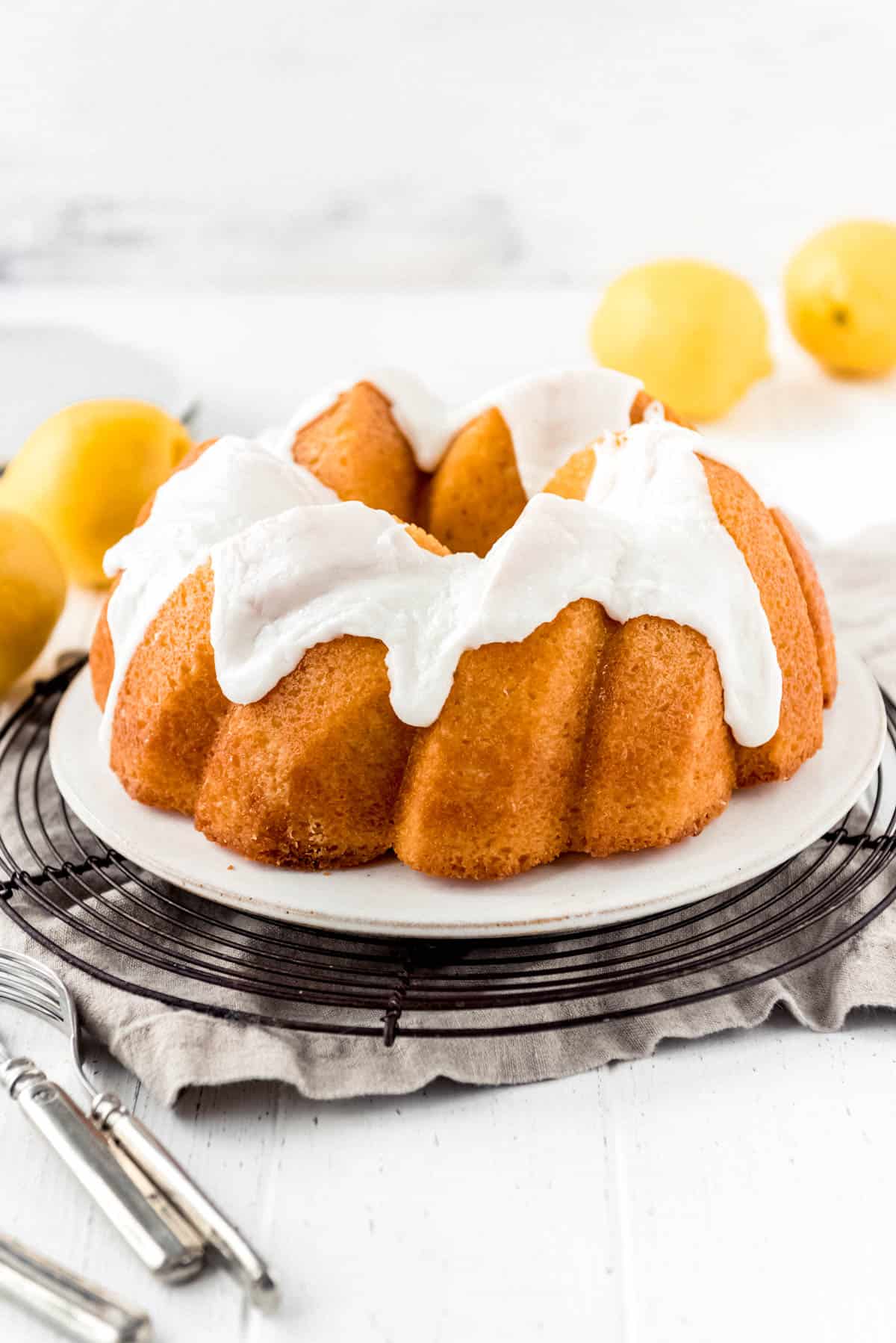 a lemon bundt cake topped with lemon icing