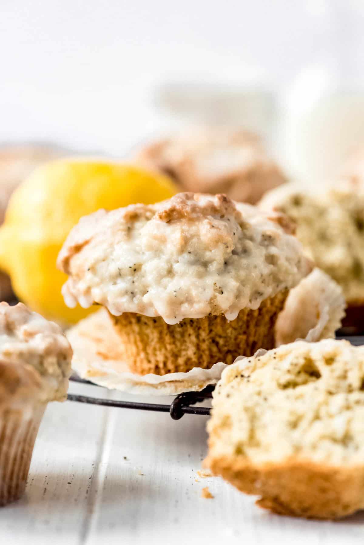 a close image of glazed lemon poppy seed muffins