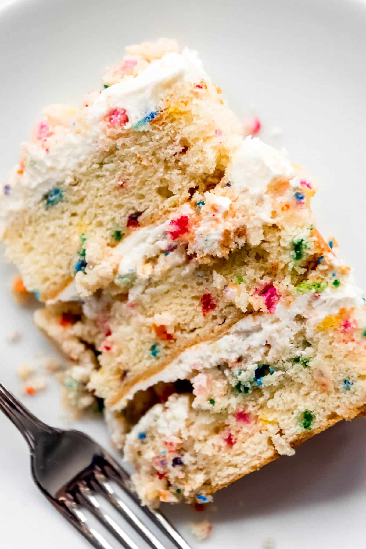A close image of the texture of a funfetti birthday cake.