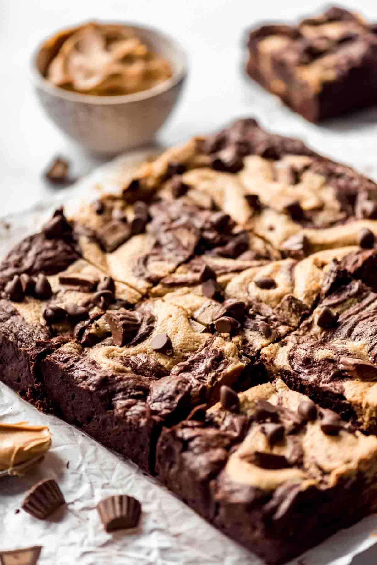 Side shot of freshly cut Peanut Butter Swirl Brownies.