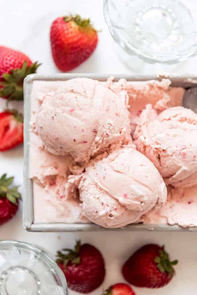a close image of scoops of homemade strawberry ice cream