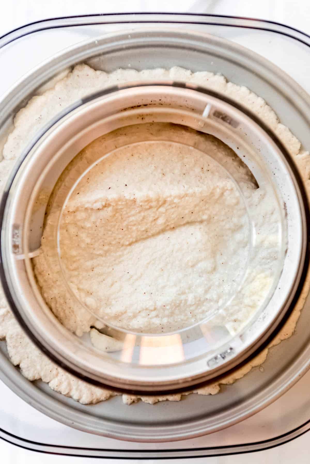 an overhead image of ice cream being churned