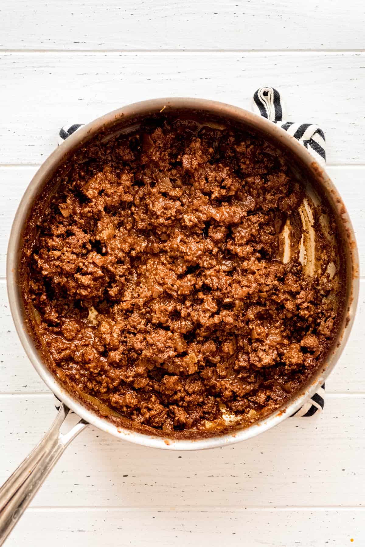 The finished beef sauce resting in a large skillet. 