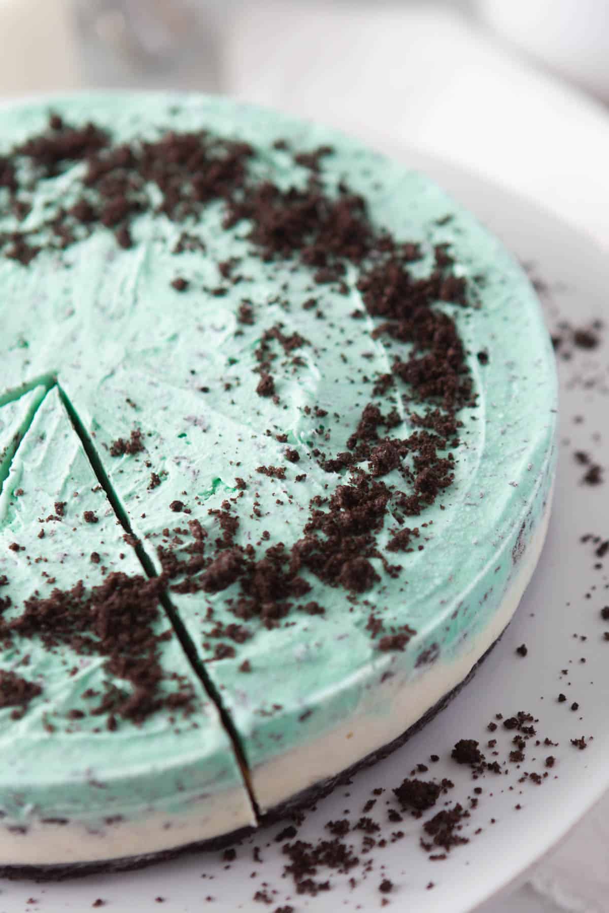 crumbled Oreos on top of a mint grasshopper ice cream pie