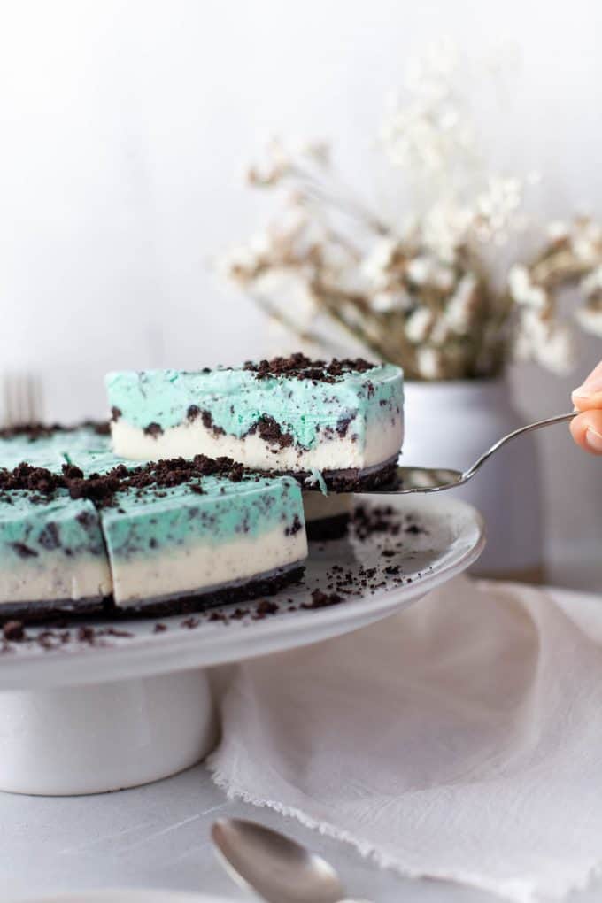 a slice of ice cream pie being lifted on a spatula