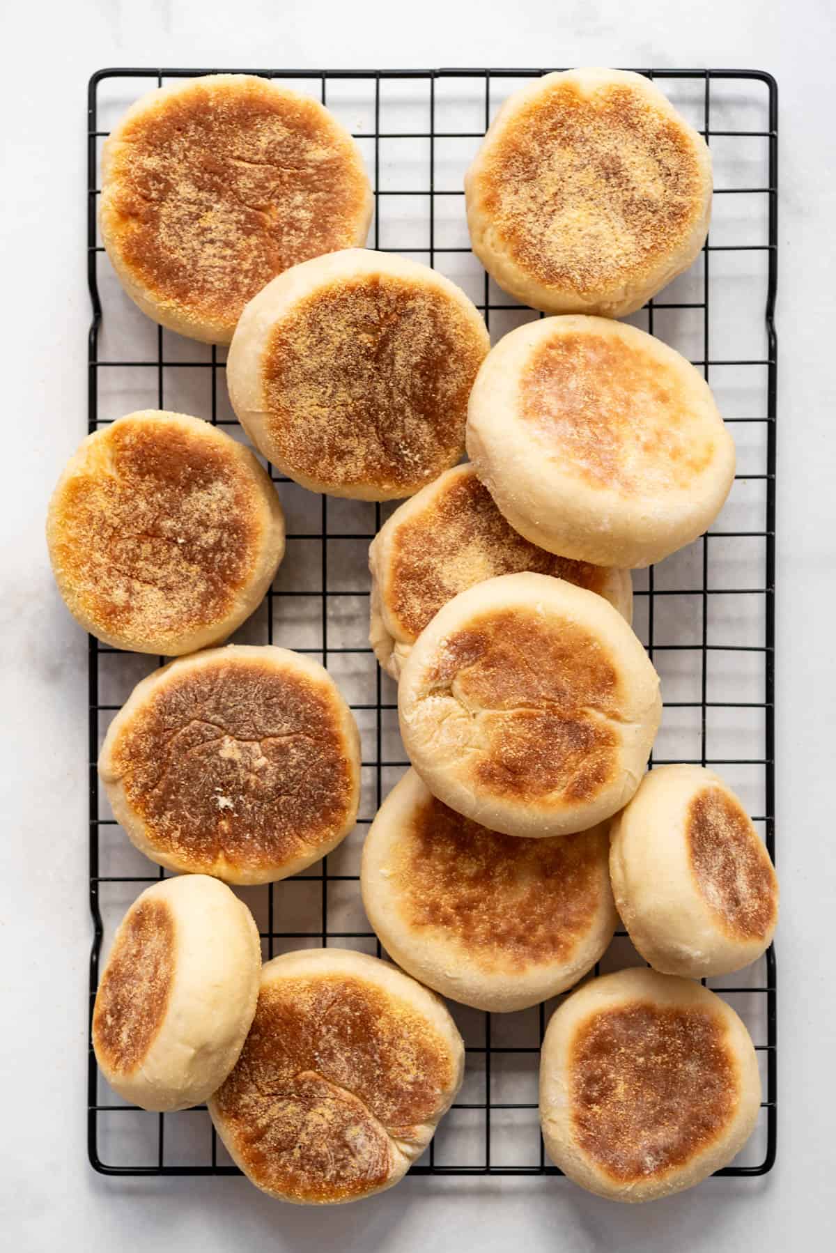 Baked Homemade English Muffins on Cooling Rack