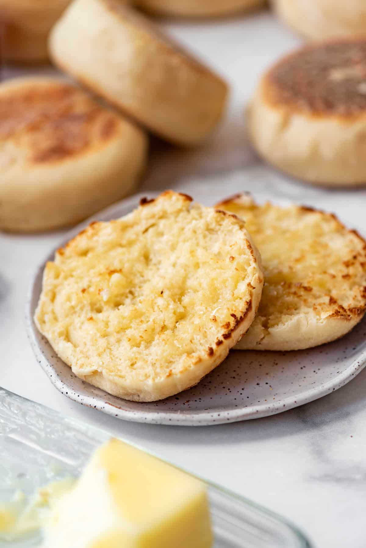 Homemade English Muffin sliced and on plate