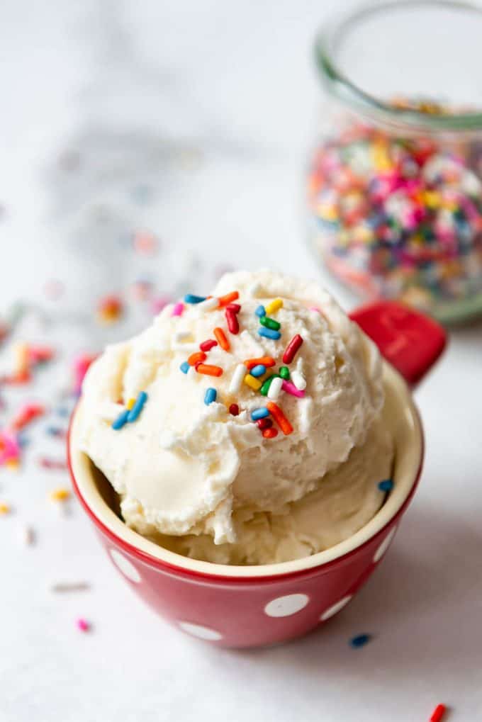 a bowl of vanilla ice cream with sprinkles on top