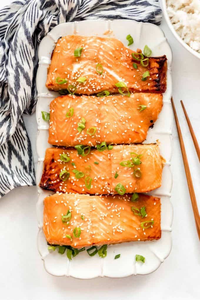 four miso salmon fillets on a plate