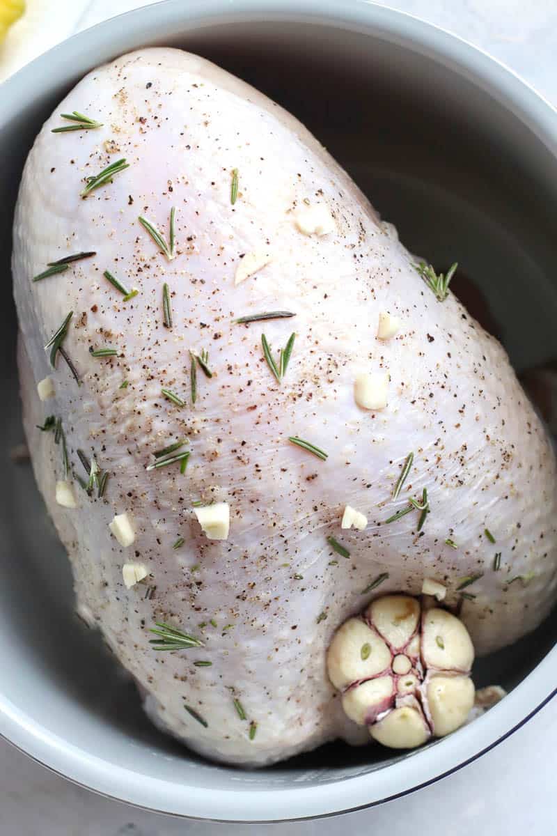 Raw seasoned turkey breast in air fryer