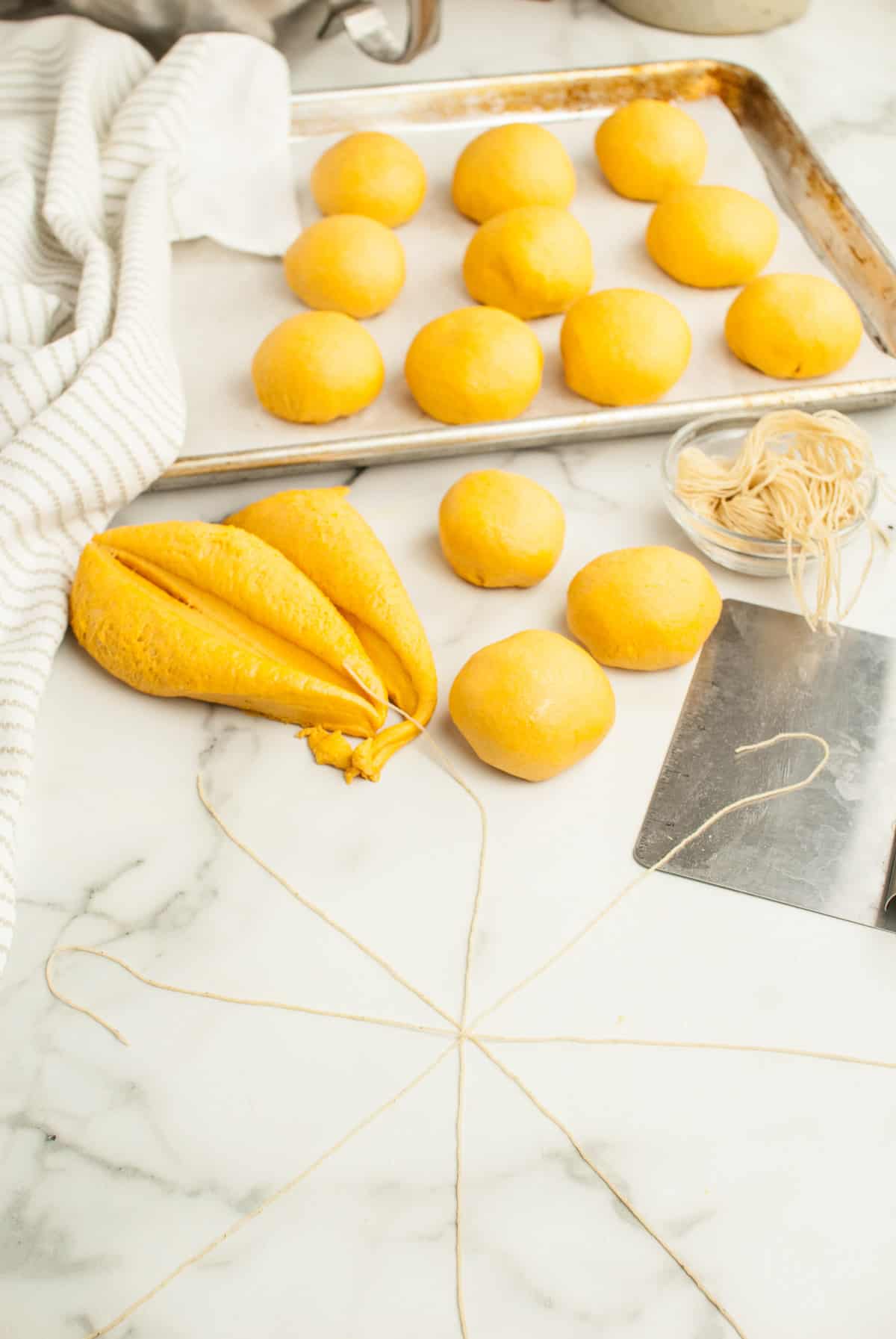 Oiled twine is arranged into a pie-shaped pattern. 