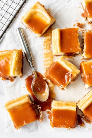 An overhead image of salted caramel cheesecake bars.