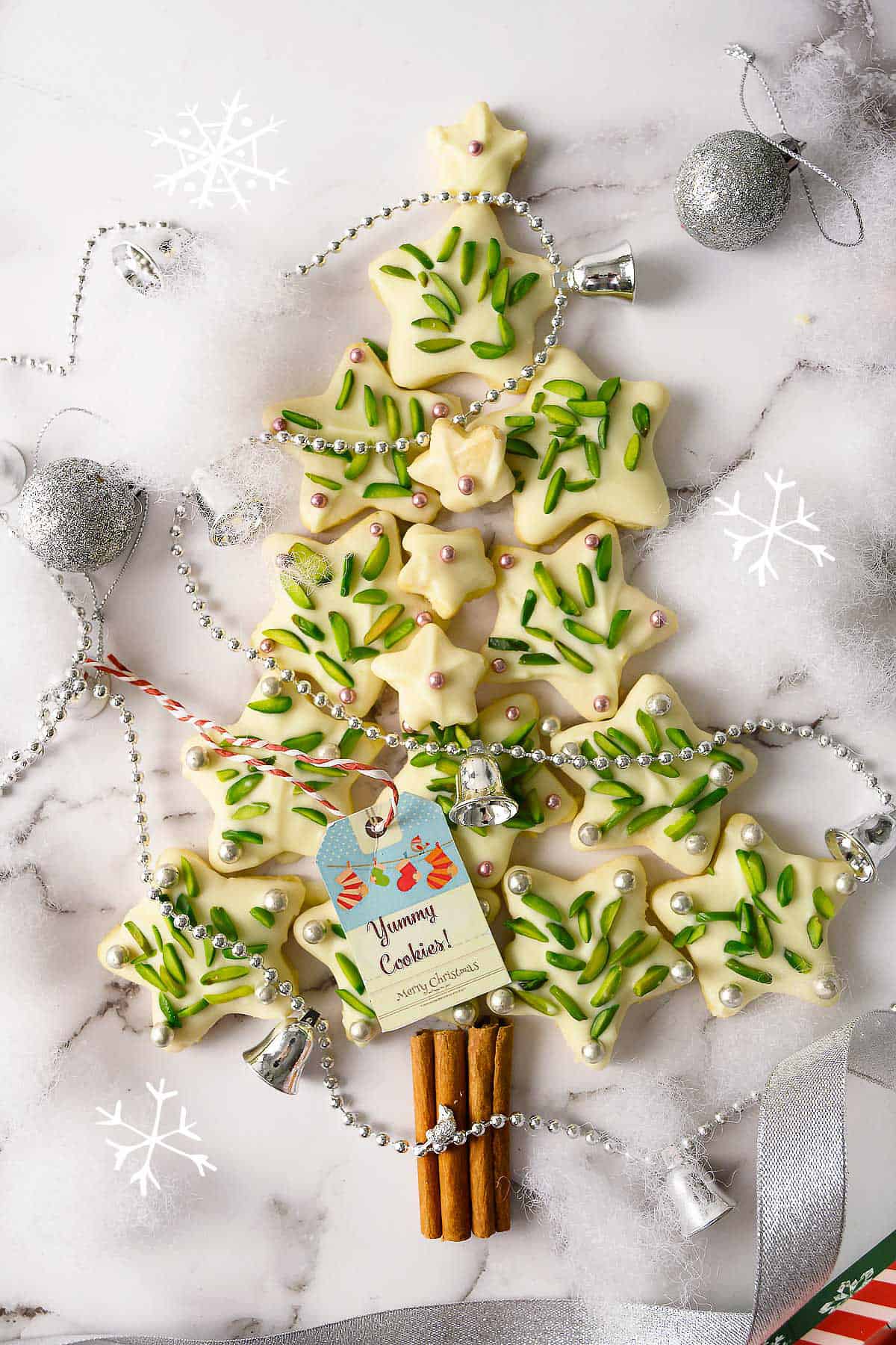 Christmas star cookies arranged in the shape of a Christmas tree.