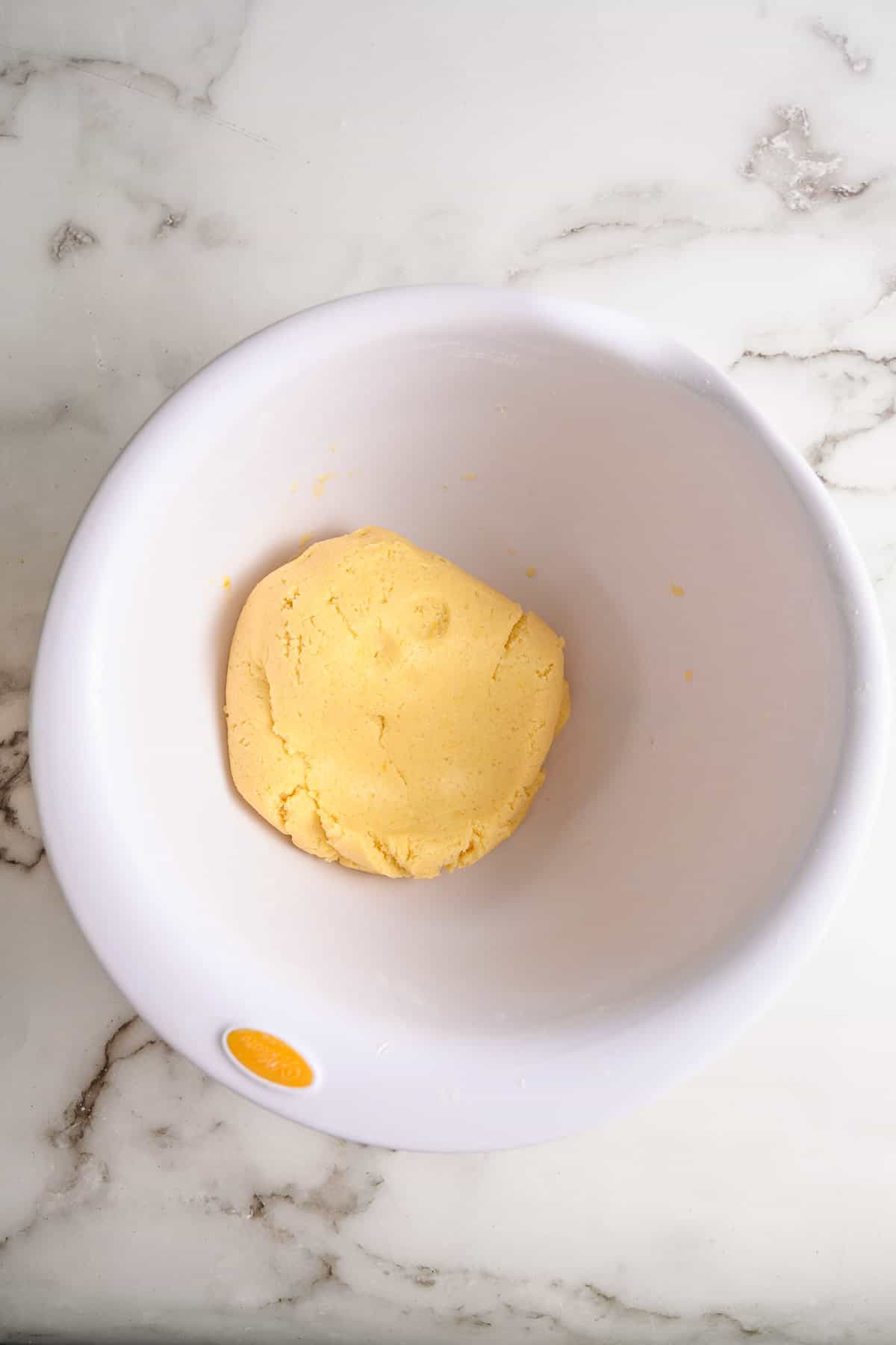 Sugar cookie dough in a bowl.