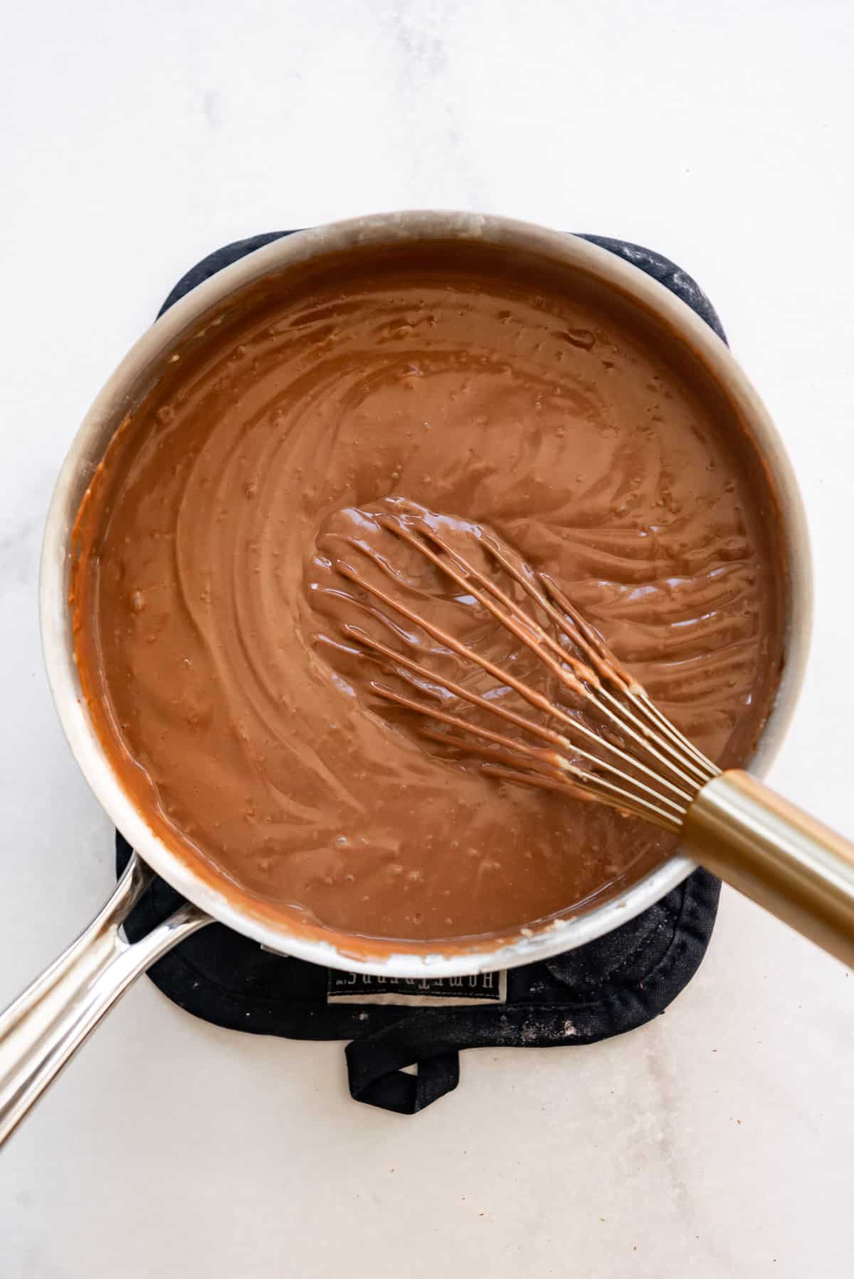 An image of homemade chocolate custard for filling a chocolate cream pie.