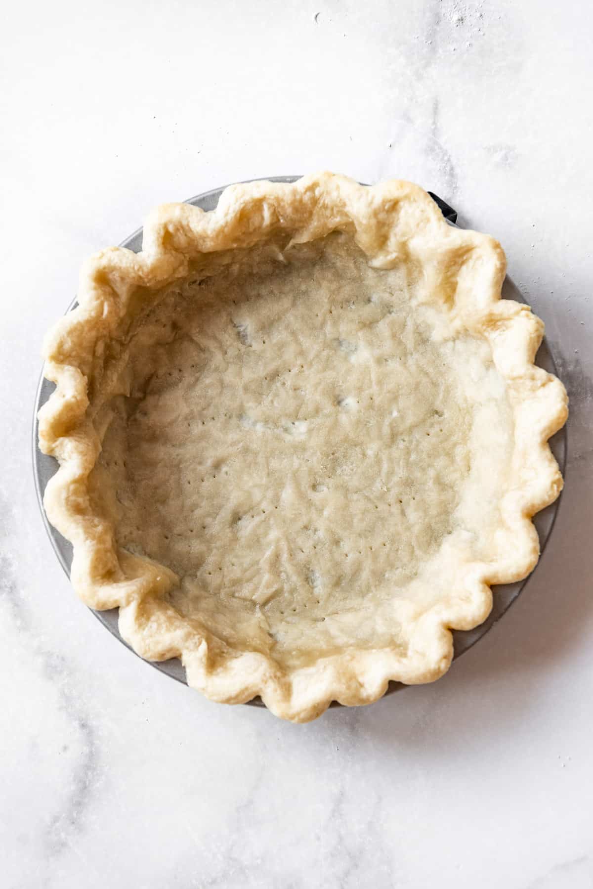 A parbaked pie crust.