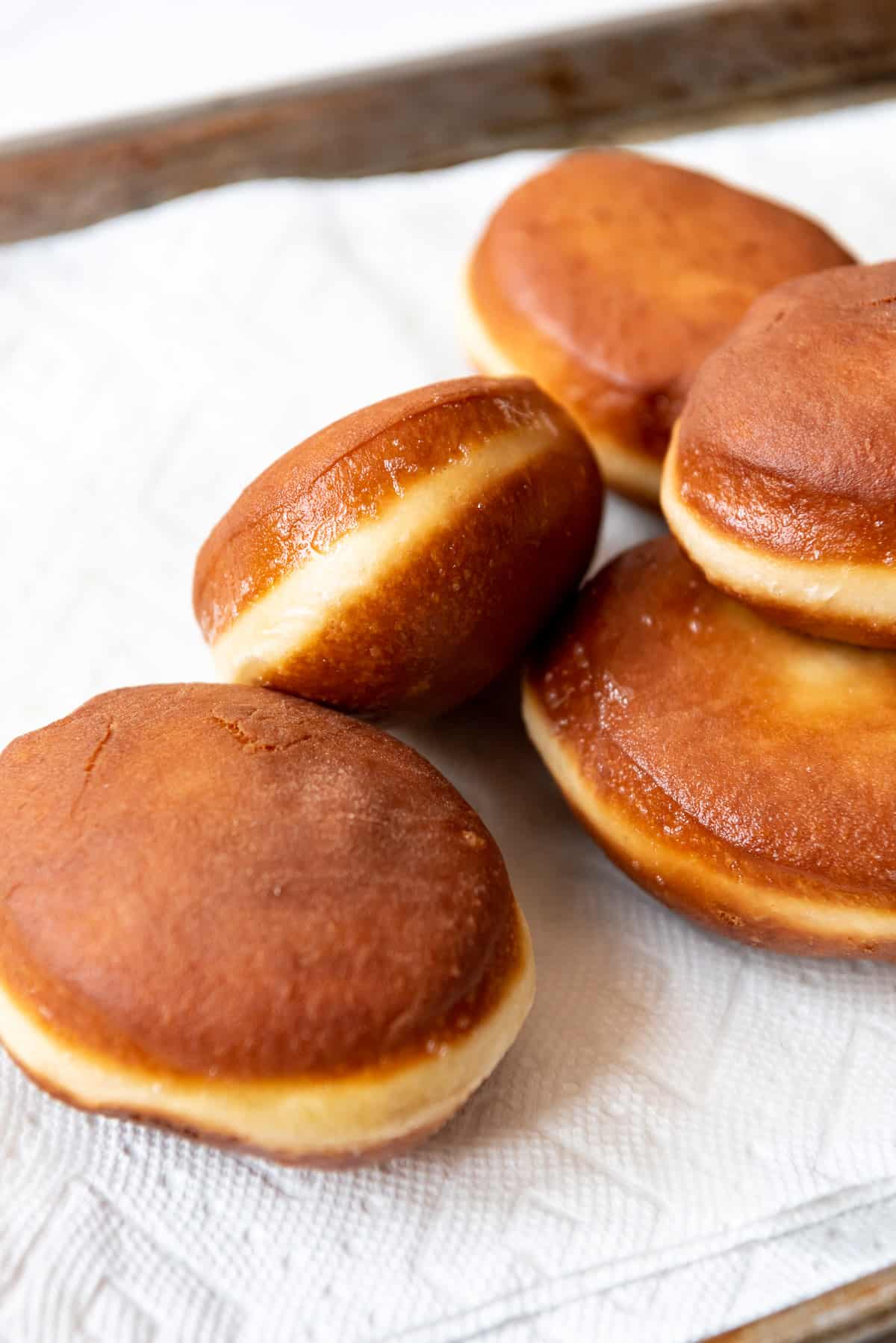 Yeast donuts fresh out of the fryer.