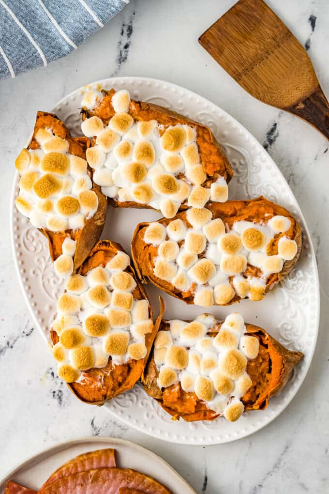 Toasted marshmallows on top of twice baked sweet potatoes.