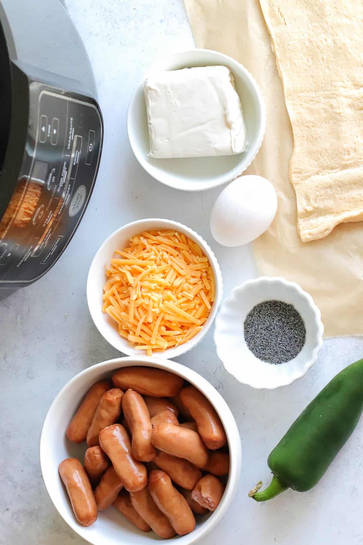 Ingredients for making air fryer jalapeno popper pigs in a blanket.