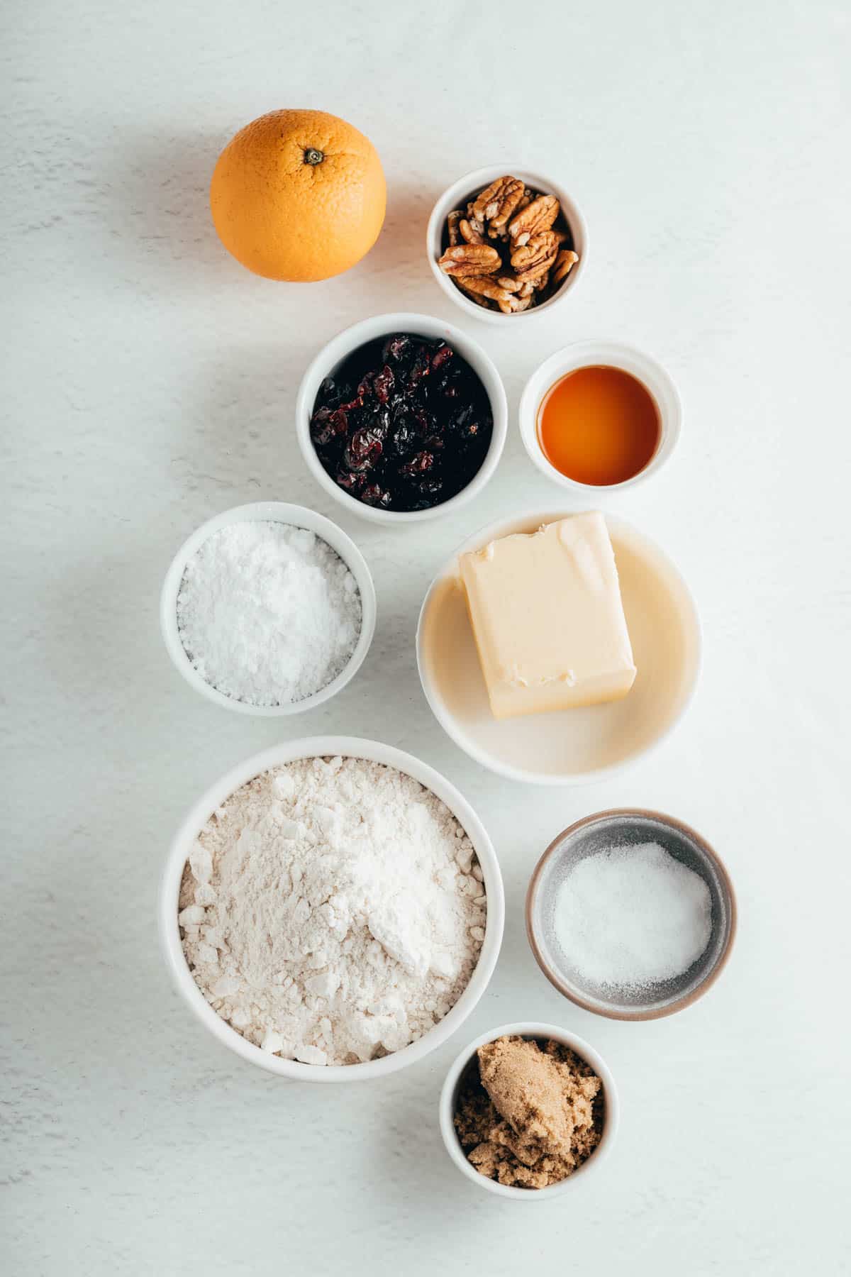 Ingredients for making cranberry pecan shortbread cookies.