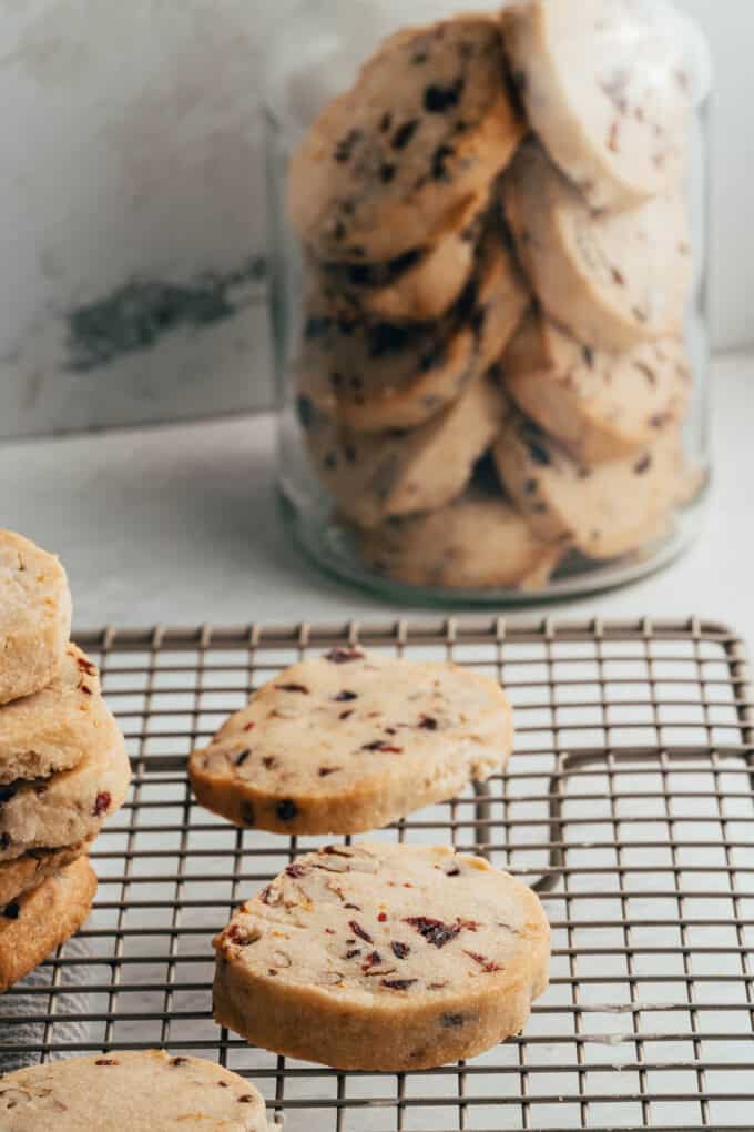 Baked shortbread cookies on a cooling rack.