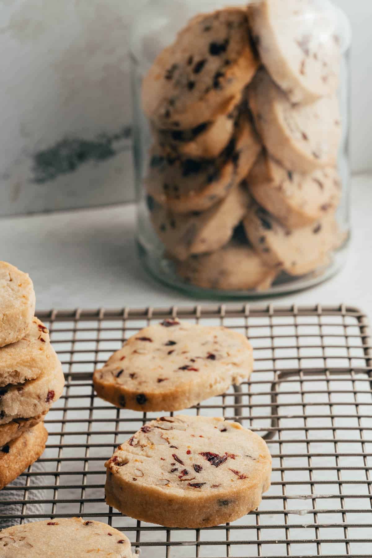 Baked shortbread cookies on a cooling rack.