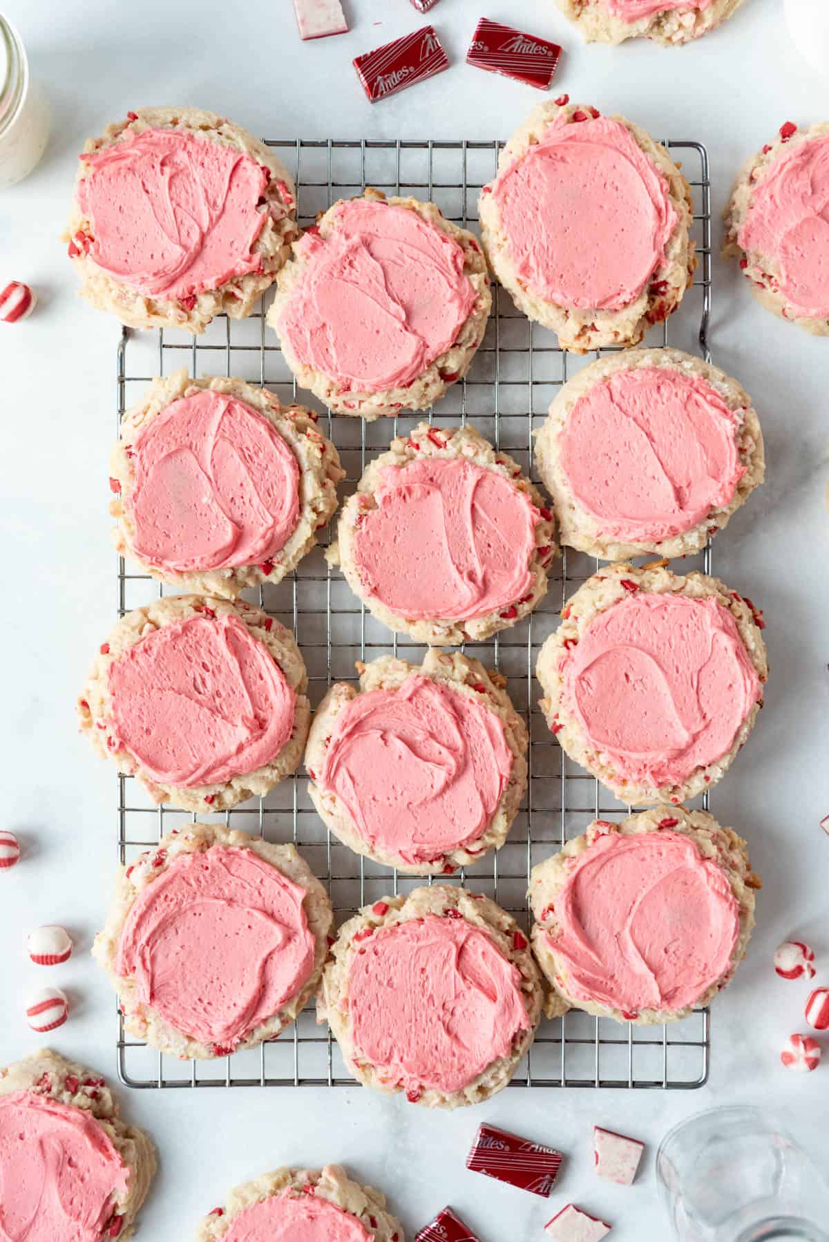 Frosted Swig Peppermint Sugar Cookies on a wire rack.