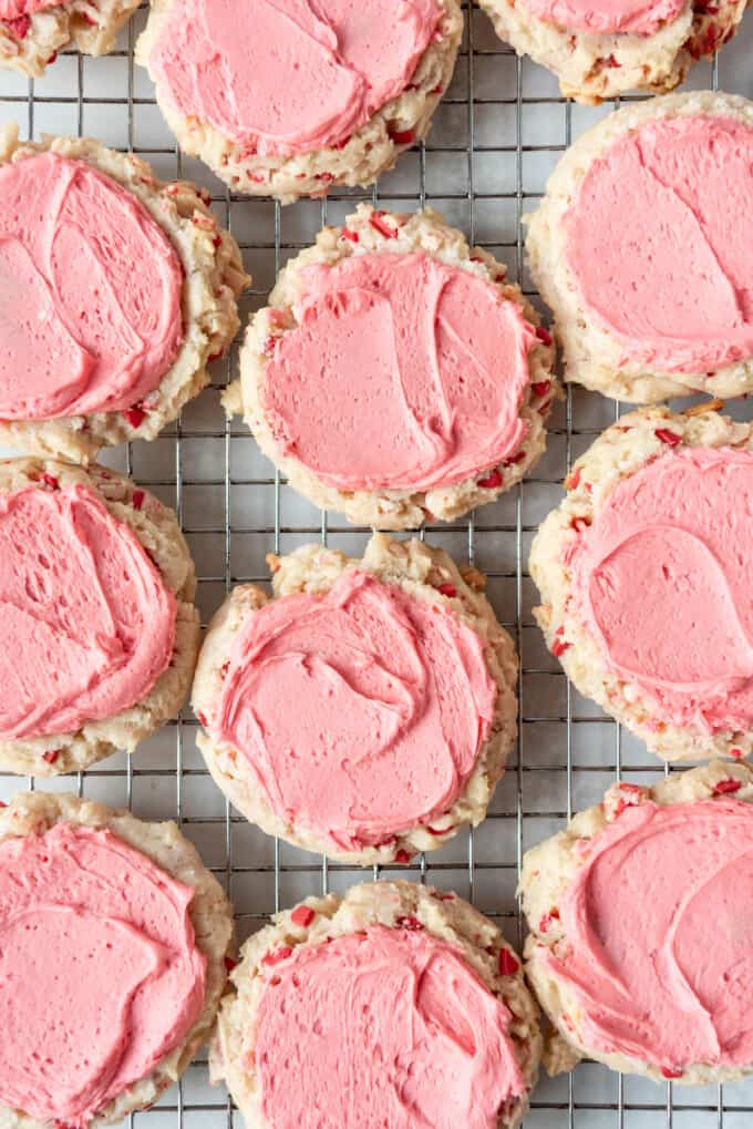 An overhead image of peppermint swig sugar cookies on a wire rack.