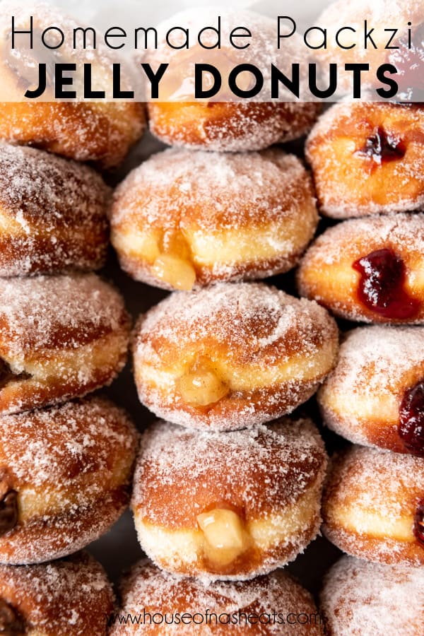Jelly donuts covered in granulated sugar and filled with nutella, apple filling, or raspberry jelly.