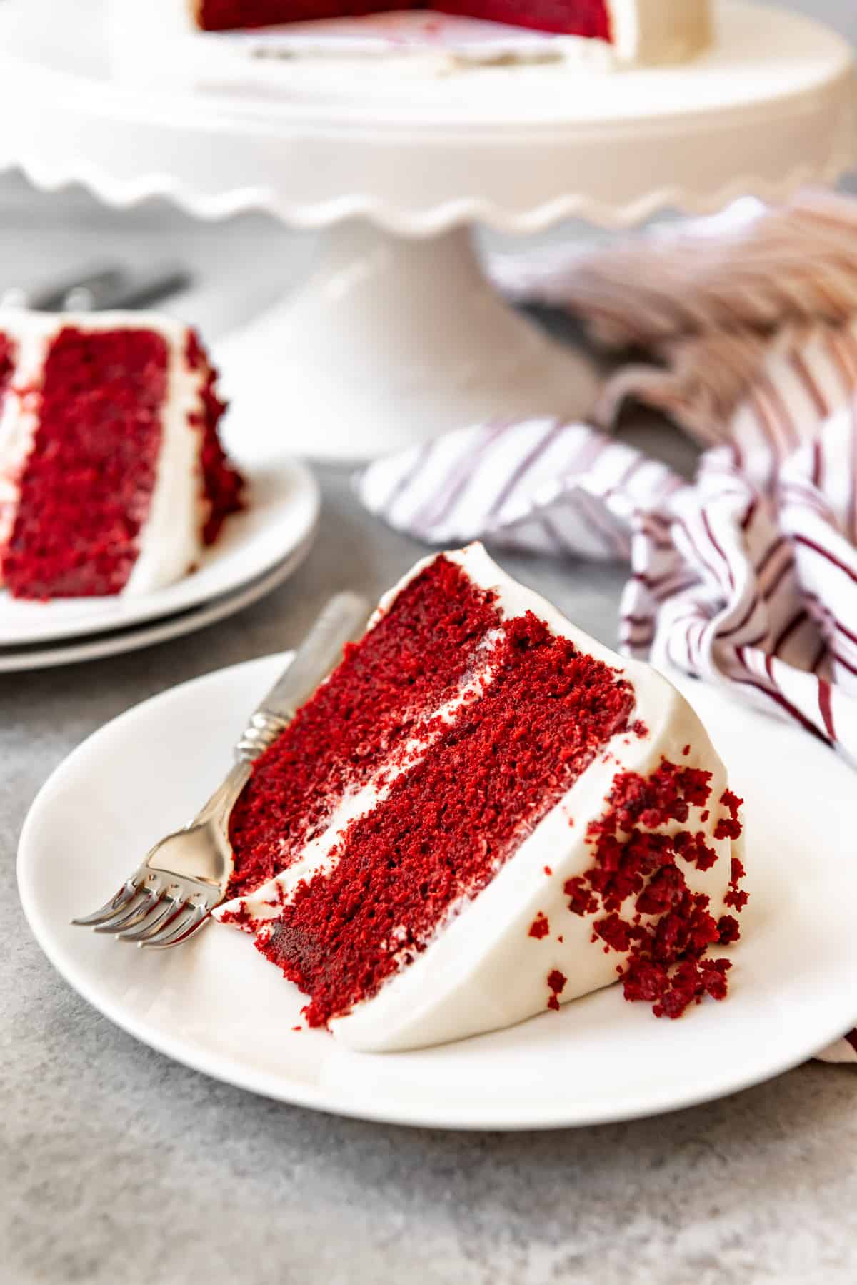 An image of a moist homemade red velvet cake made from scratch.