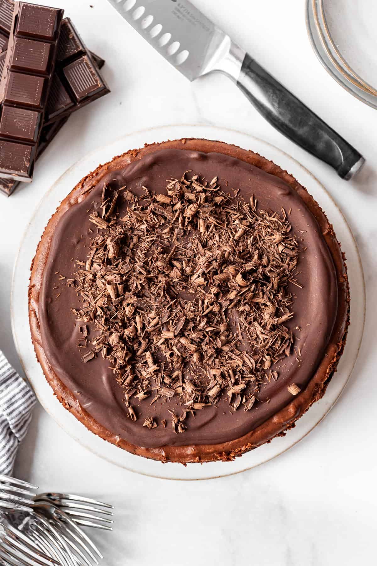 Chocolate shavings added to the top of the chocolate cheesecake. 