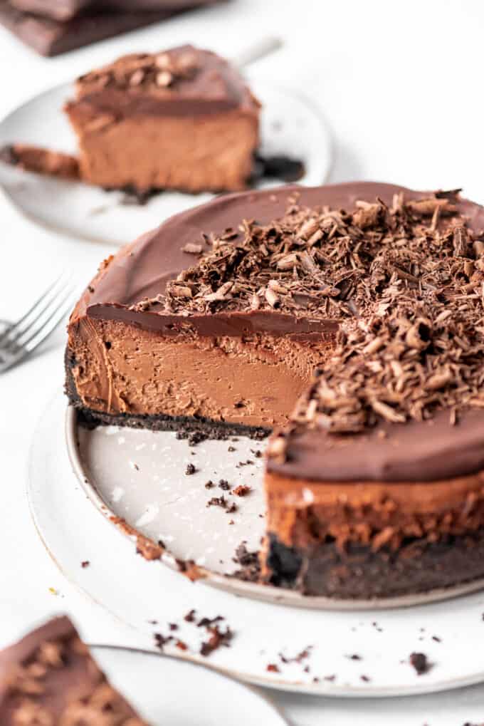 Chocolate cheesecake being served.