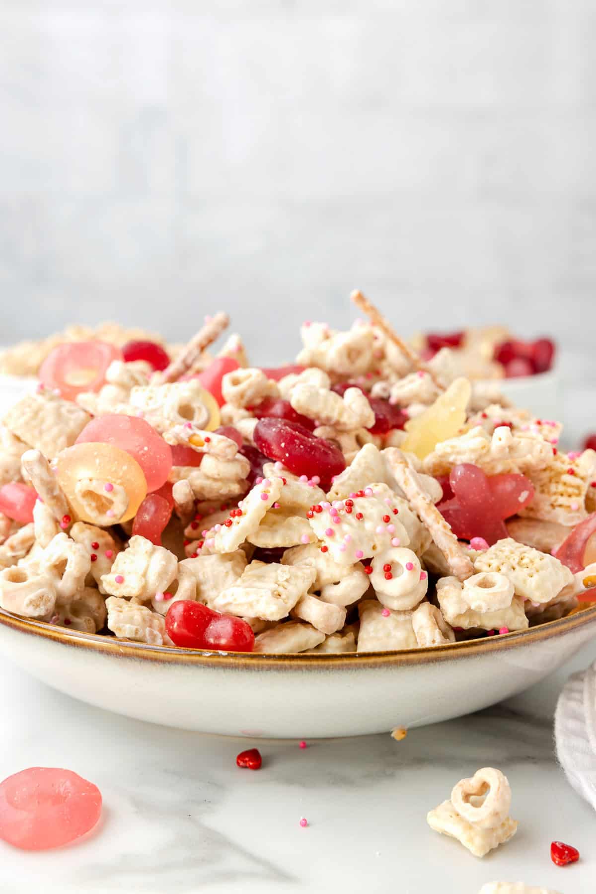 A large shallow bowl of Cupid Crunch chex mix.