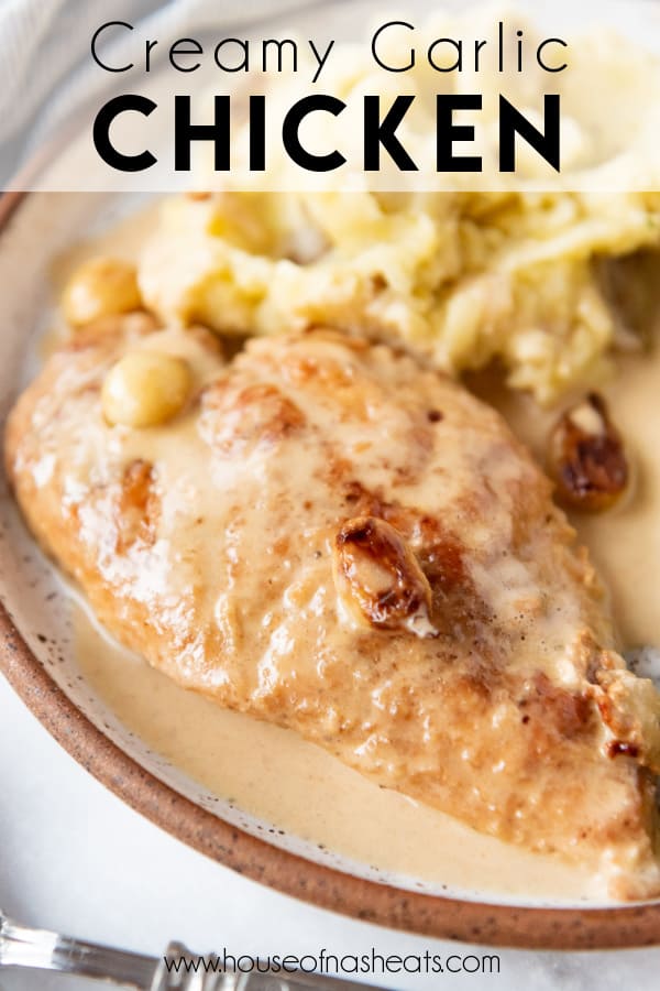 A piece of chicken in a creamy garlic sauce with text overlay.