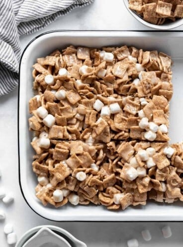 A pan of homemade Cinnamon Toast Crunch Bars made with cereal and marshmallows.