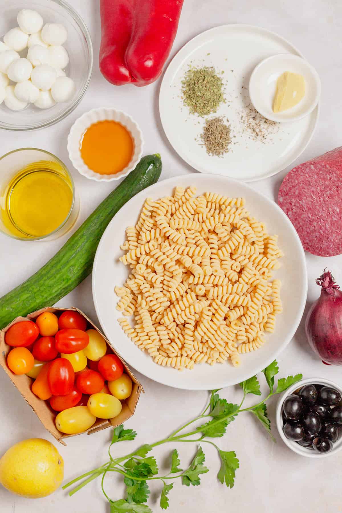 Ingredients for making Italian pasta salad.