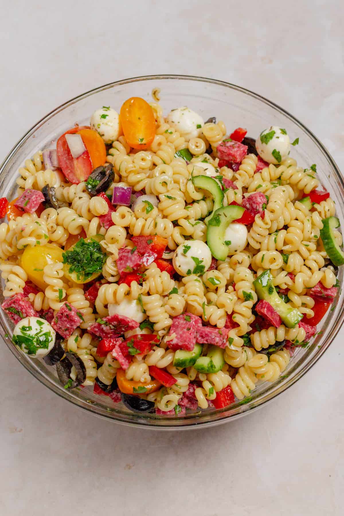 All of the pasta salad ingredients mixed together.