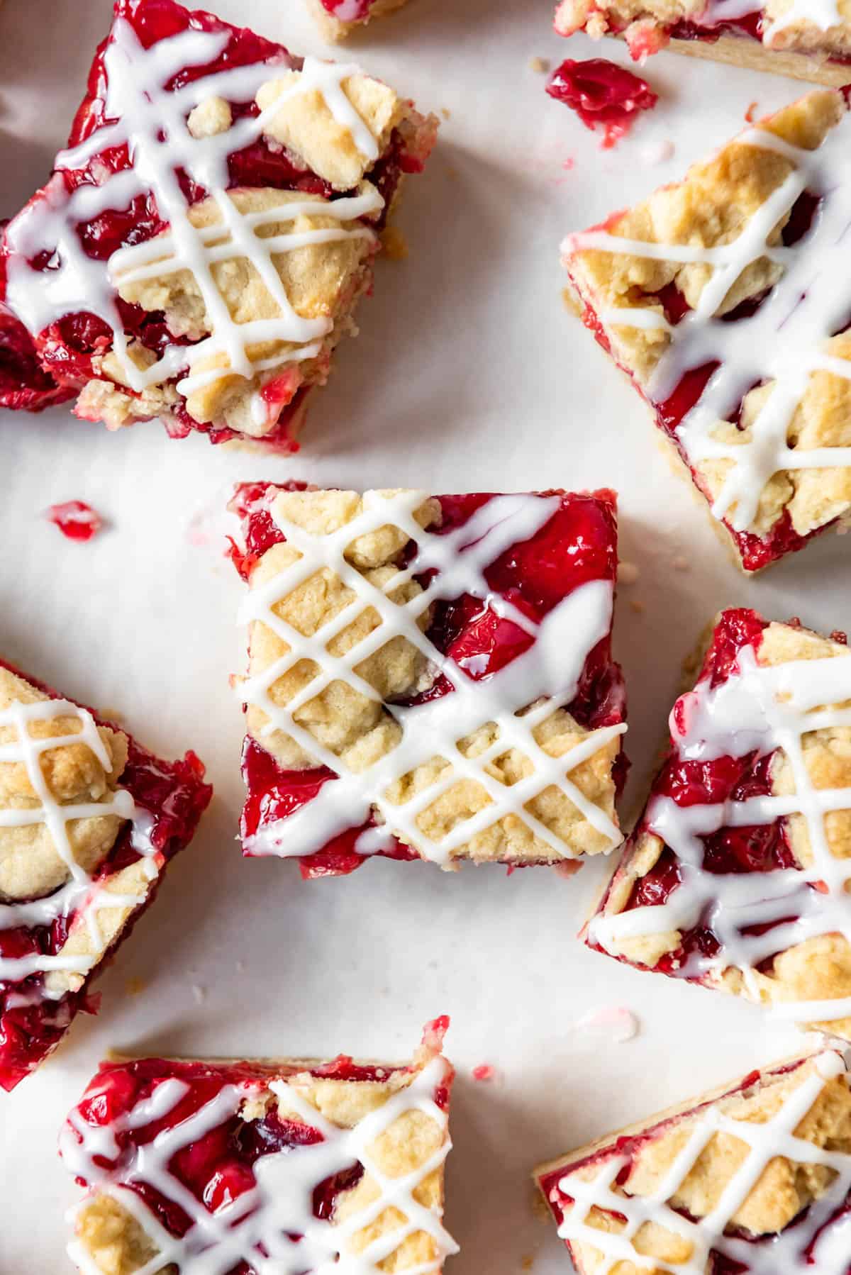 An overhead image of a square cherry dessert bar with homemade cherry pie filling.