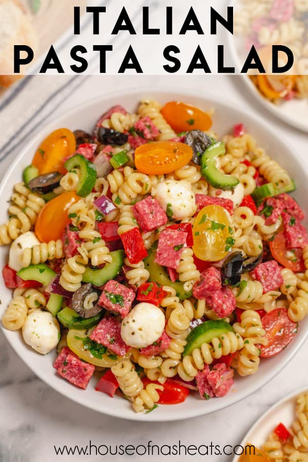 A large bowl of Italian Pasta salad with text overlay.