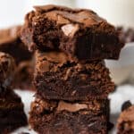 Three brownies stacked into a tower.