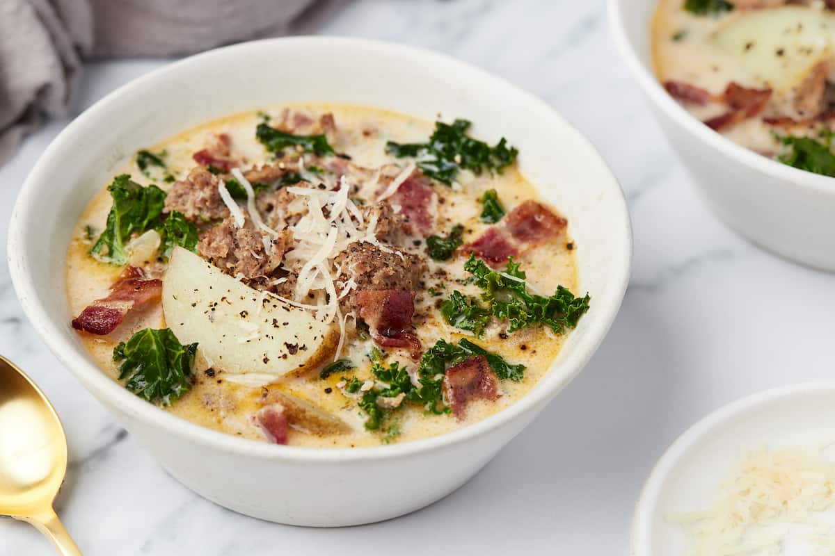 A close-up shot of a bowl full of homemade Zuppa Toscana soup