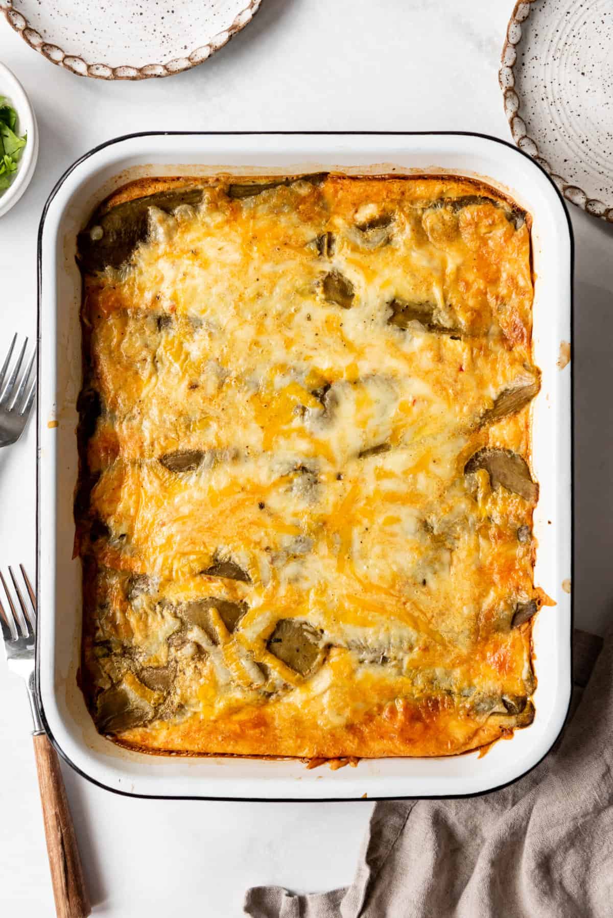 Baked chile rellenos casserole in a casserole dish.
