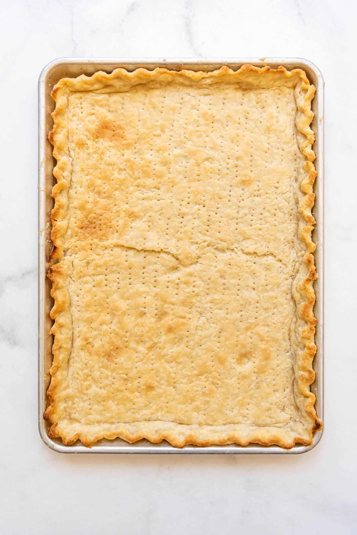 A blind baked slab pie crust.