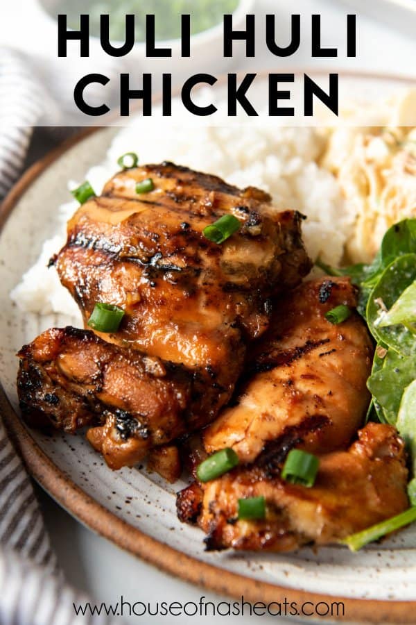 Marinated, grilled chicken thighs on a plate with text overlay.